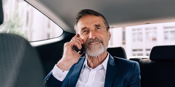 Man receiving a reminder phone call for a doctor's appointment