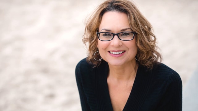 Carolyn Ziel — Professional headshot with genuine bright smile