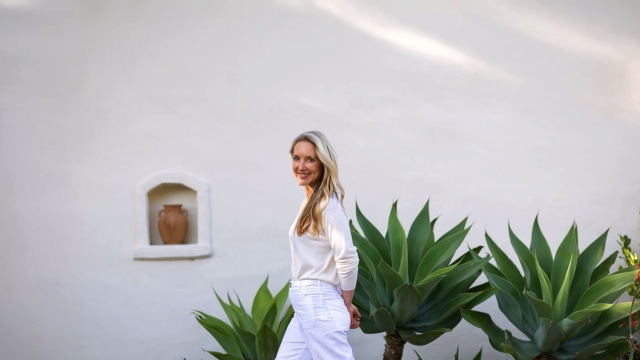 Diana Hill — Woman posing outdoors by agave plants