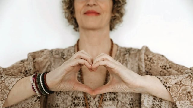 Diane Yeo — Person making heart hand gesture