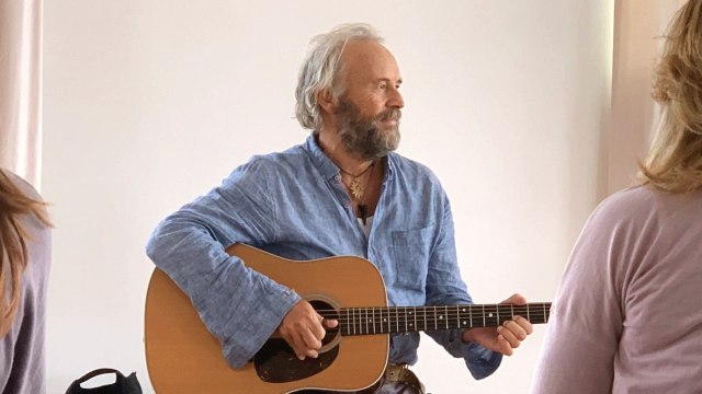 Jack Harrison — Musician performing acoustic guitar with audience