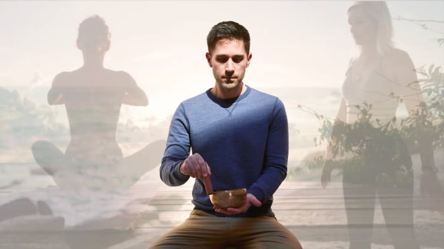 Michael Galyon — Man meditating with singing bowl