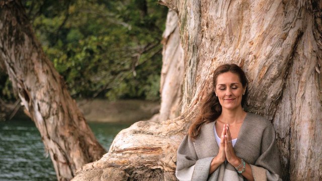 Rosalie e’Silva — Woman meditating by ancient trees