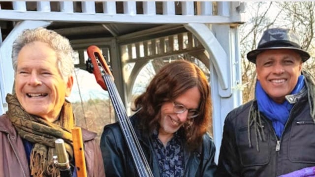 Steve Gorn — Three musicians with instruments outside