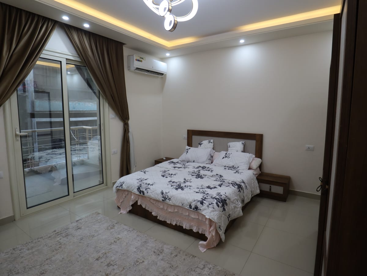 Modern 2BR Apartment | Balcony Overlooking Greenery