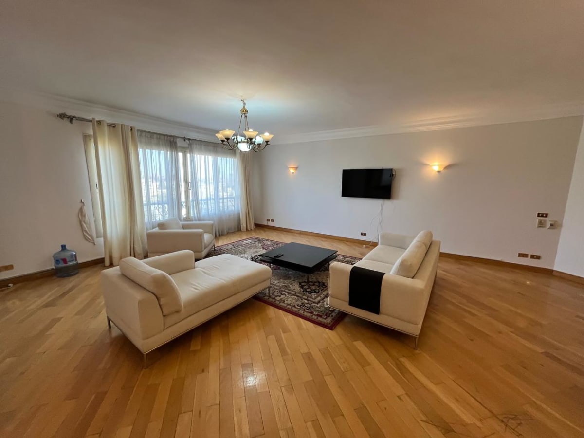 Serene Apartment with Green Views & Shared Pool In Maadi Sarayat.