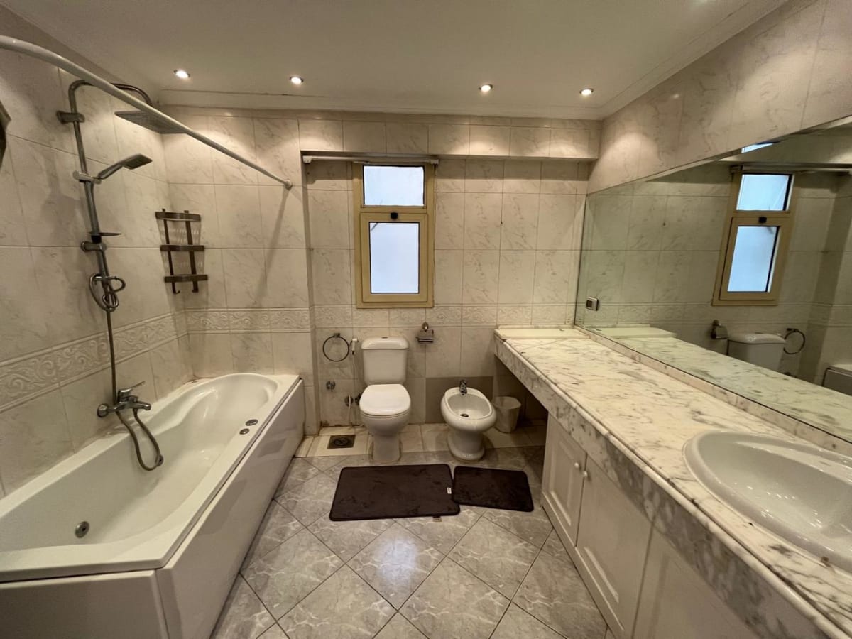 Serene Apartment with Green Views & Shared Pool In Maadi Sarayat.