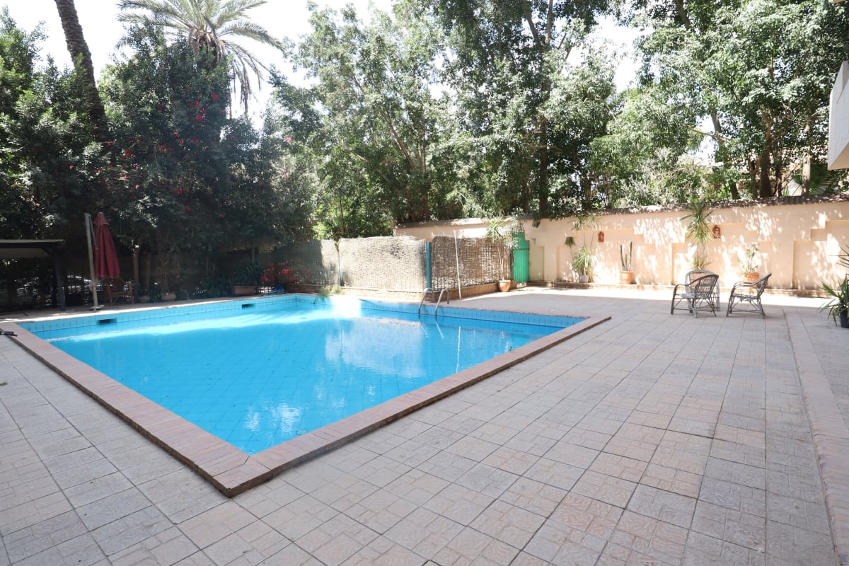 Chic Duplex Retreat with Shared Pool in Sarayat El Maadi.