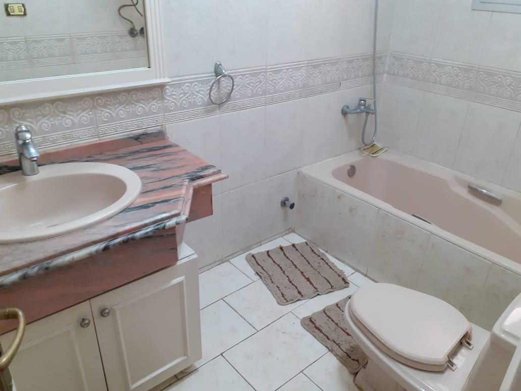 Chic Duplex Retreat with Shared Pool in Sarayat El Maadi.