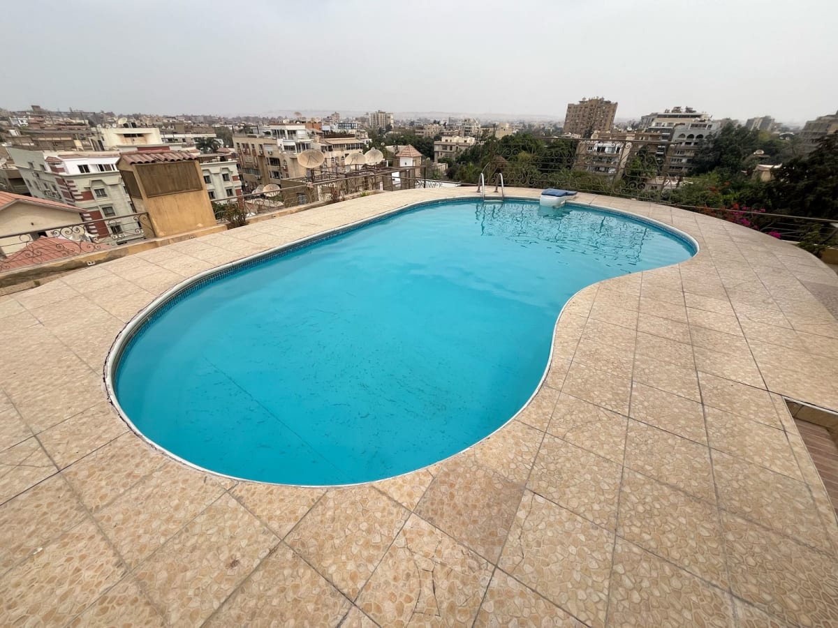 Spacious 4 Bedroom Apartment with Terrace & Pool Access