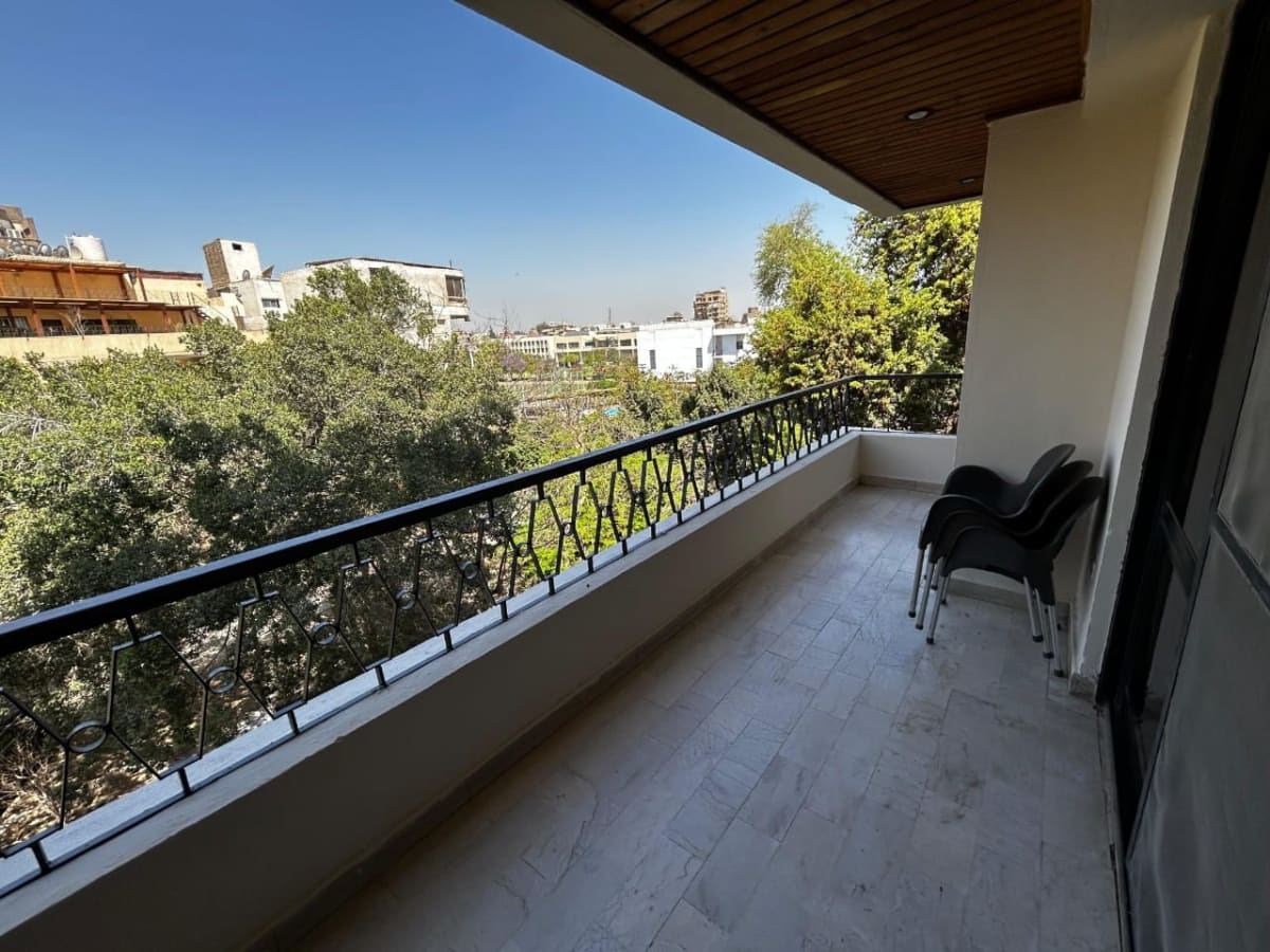 Sunlit 3-Bedroom Apartment with Private Balcony