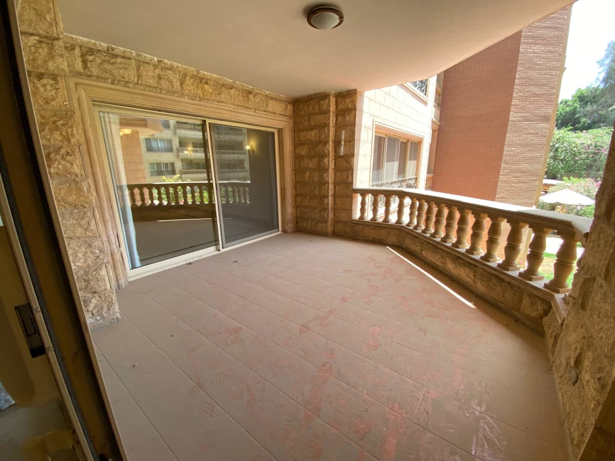 Apartment With Wide Balcony In Amazing Compound.