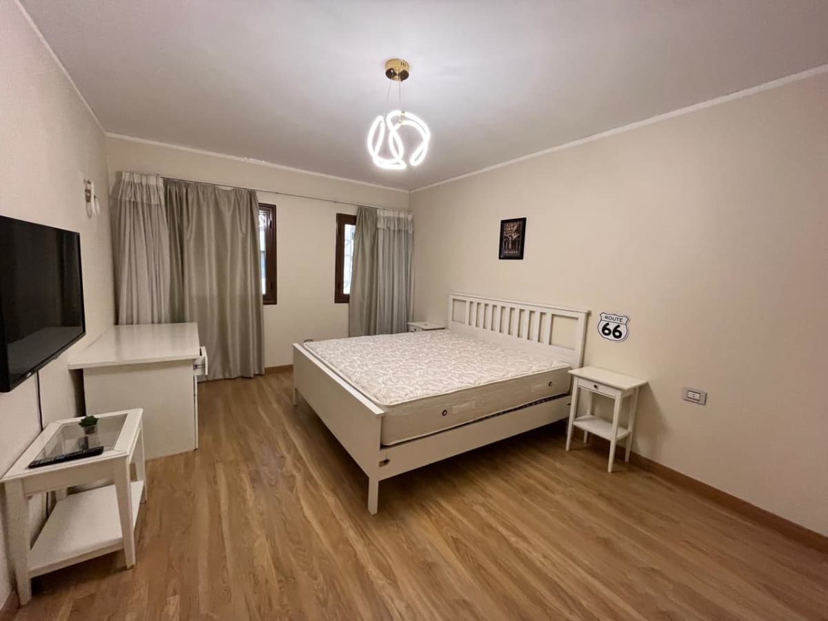 4BR Apartment with Pool & Garden Access in Prime Location