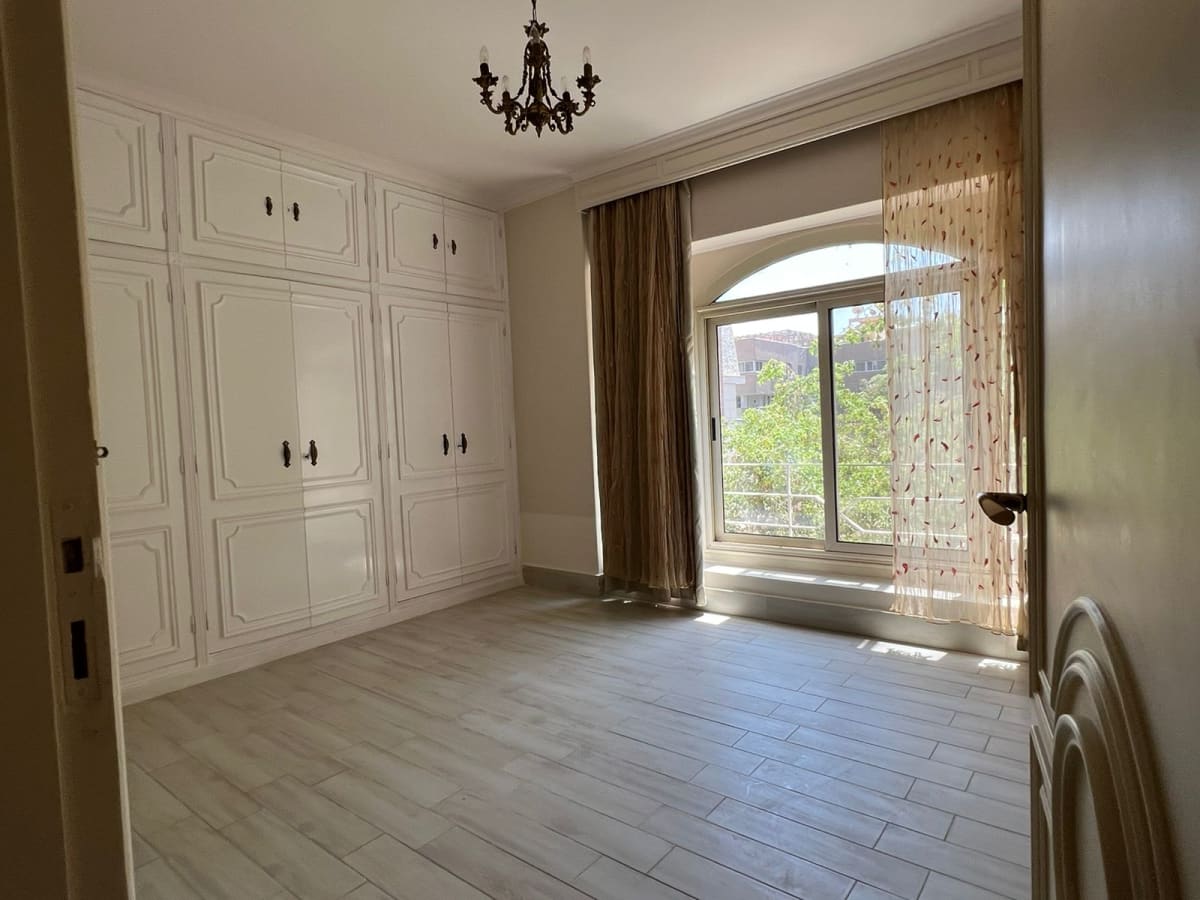Bright 3BR Apartment with Balcony & Green Views | Prime Location In Maadi