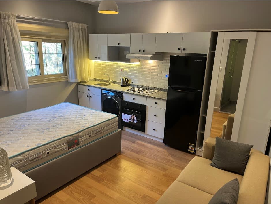 Warm With shared garden terrace Studio In Maadi Sarayat.