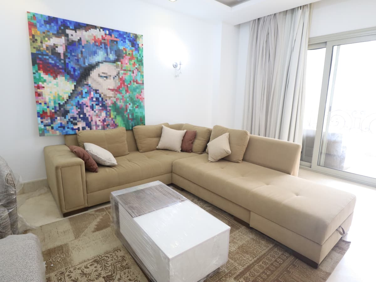 A Spacious Apartment With Shared Pool Access In Maadi Sarayat.