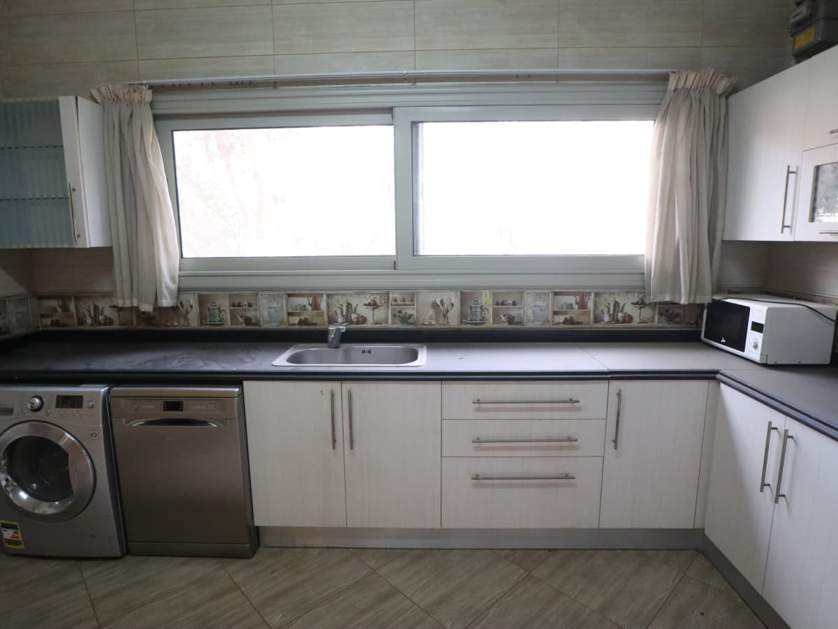 A Spacious Apartment With Shared Pool Access In Maadi Sarayat.