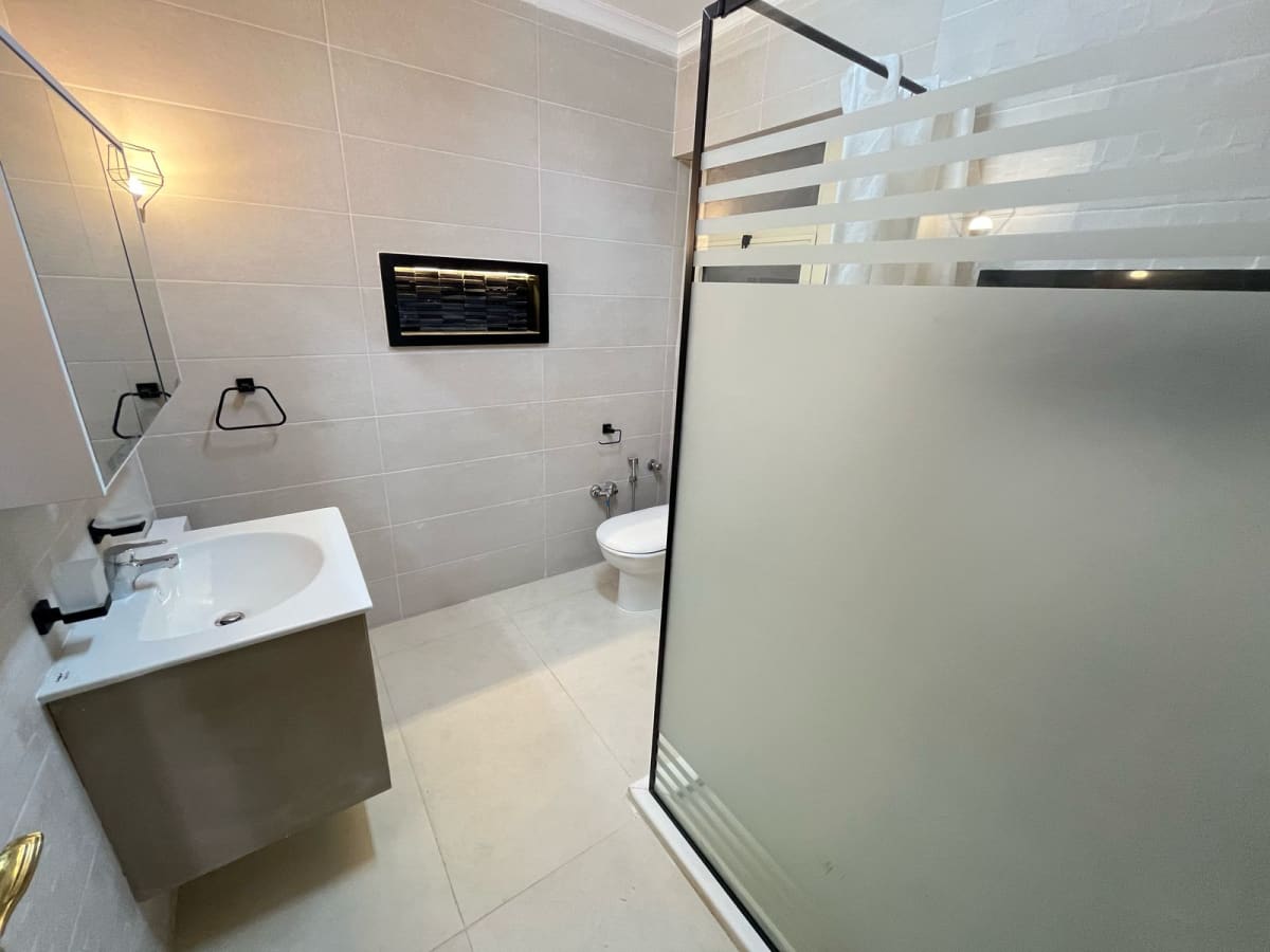 Spacious 4 Bedroom Apartment with Terrace & Pool Access