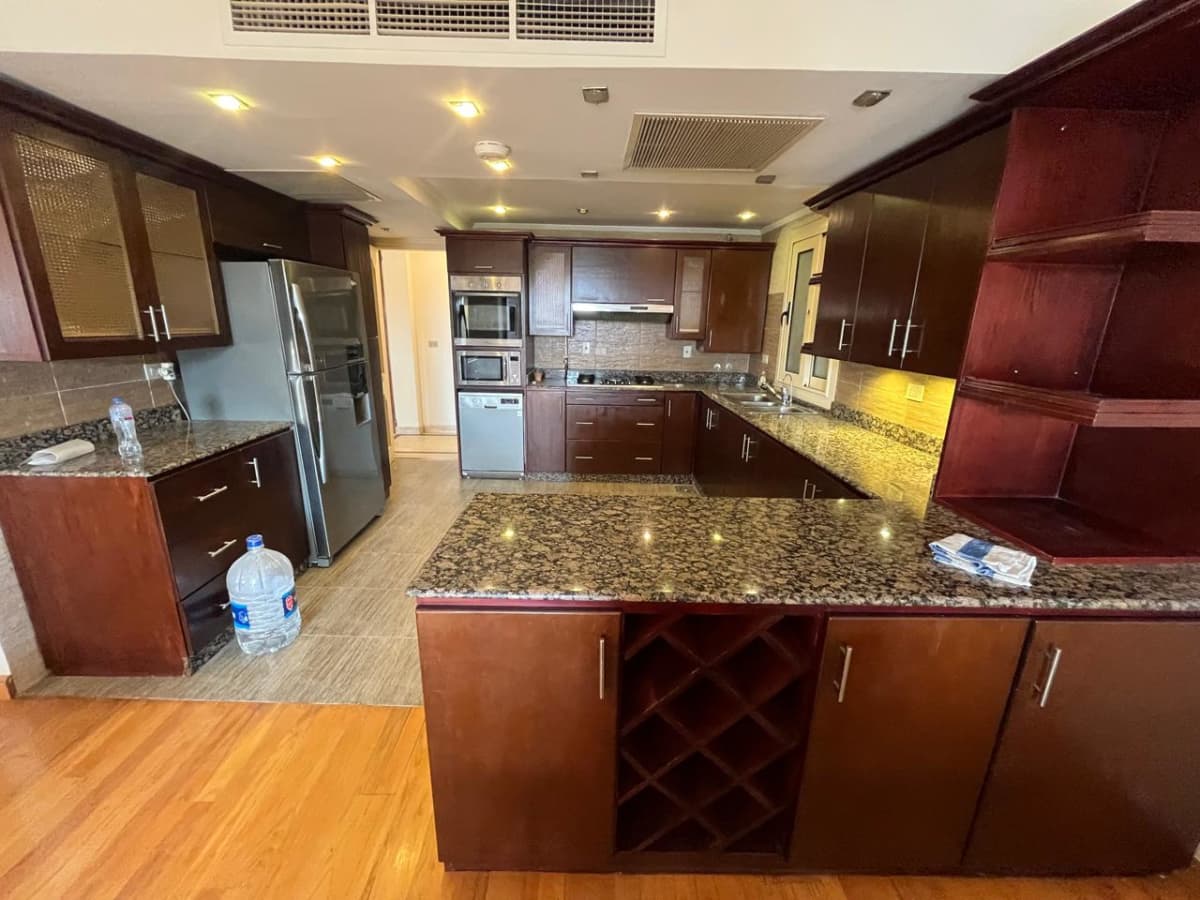 Spacious 4-Bedroom Apartment with Gym and Pool Access