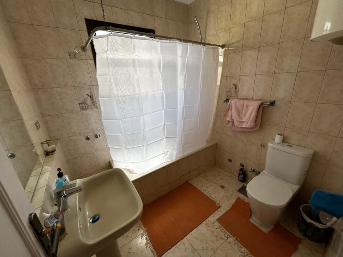 Sunlit 3-Bedroom Apartment with Private Balcony