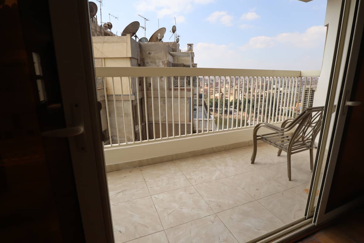 Serene Furnished Apartment With Breathtaking Nile Scenery In Zamalek.