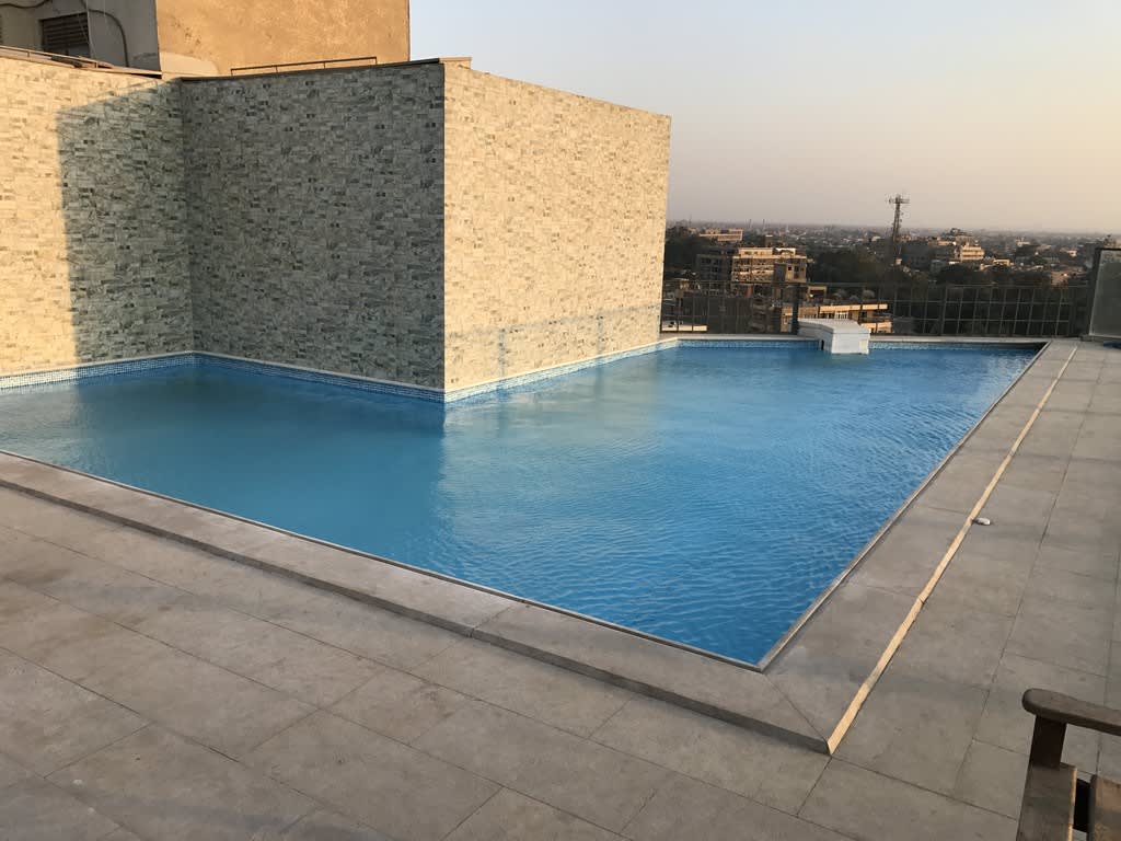 Modern 3BR Apartment with Shared Pool Access