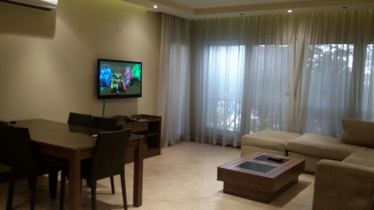 Spacious 2-BR Apartment with Private Balcony