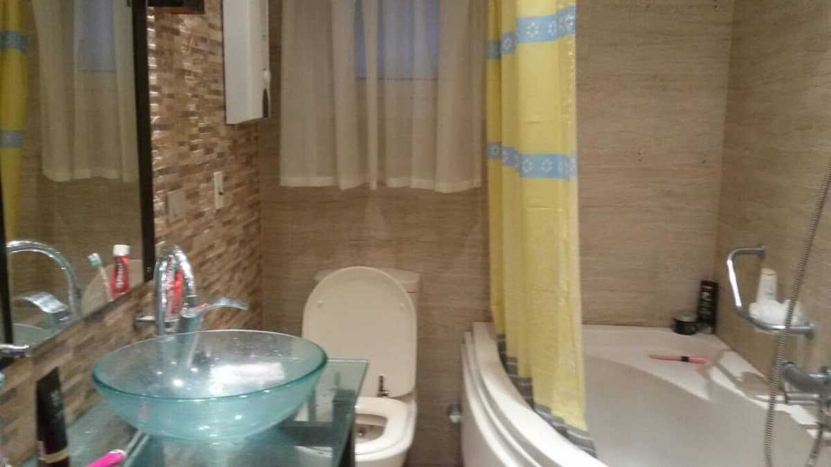 Spacious 2-BR Apartment with Private Balcony