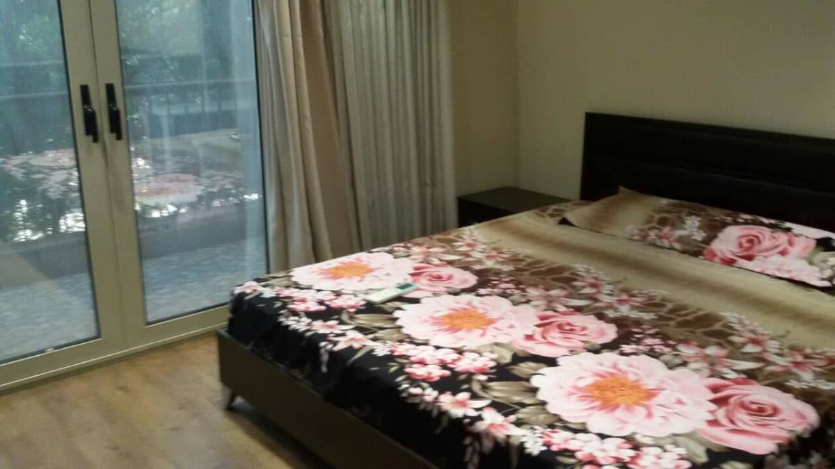 Spacious 2-BR Apartment with Private Balcony