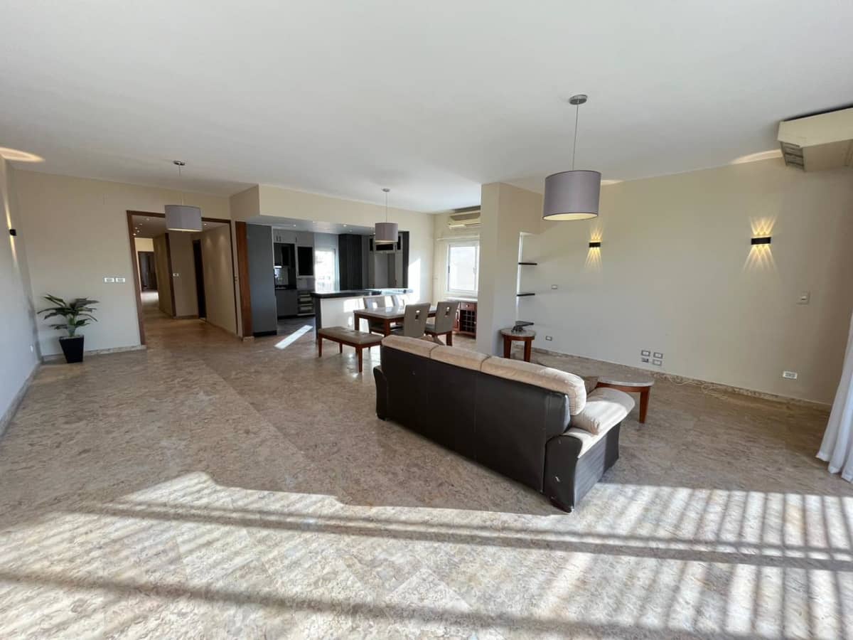 Sunny 3-BR Apartment Near Amenities in Maadi
