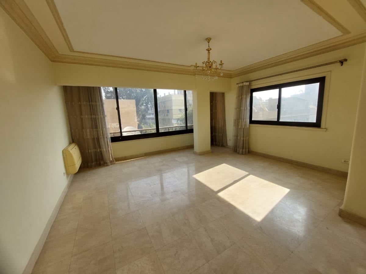 Sunlit 4-Bedroom Apartment with Green Views