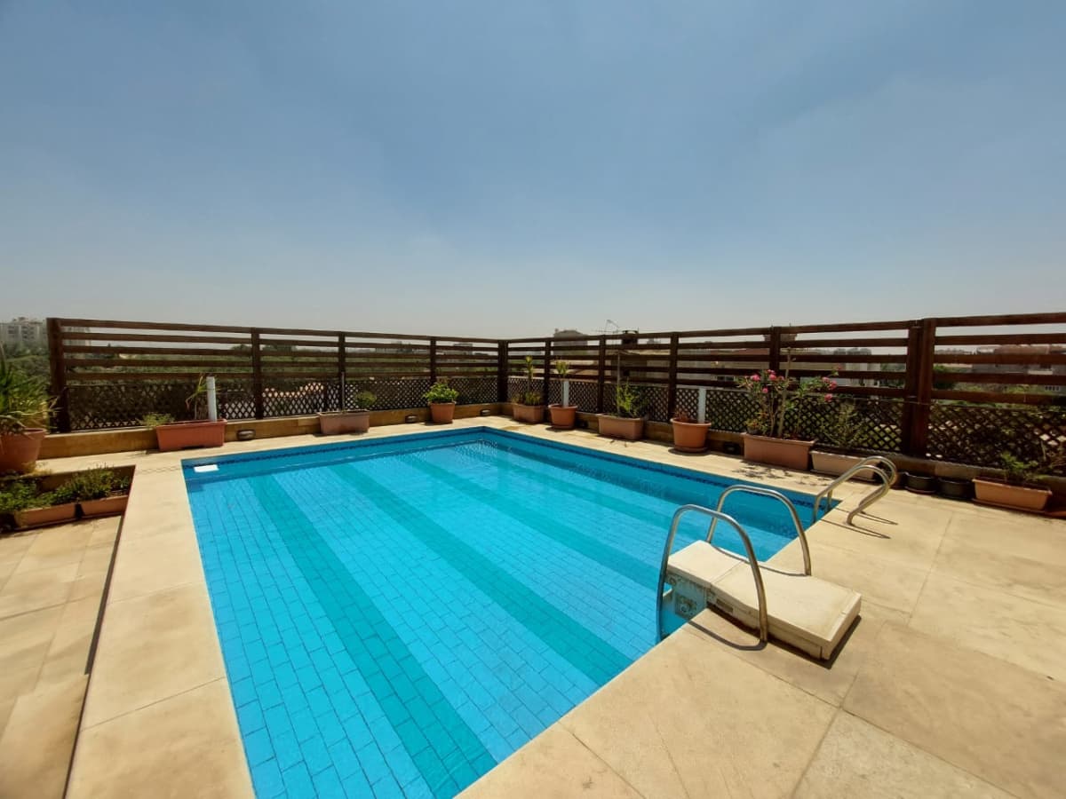 4-BR Modern Penthouse with Shared Pool in Maadi