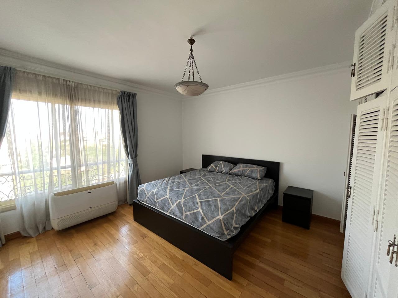 Serene Apartment with Green Views & Shared Pool In Maadi Sarayat.