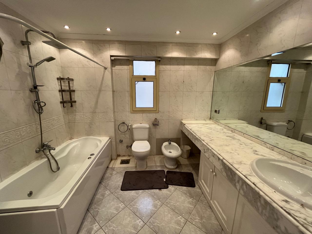 Serene Apartment with Green Views & Shared Pool In Maadi Sarayat.