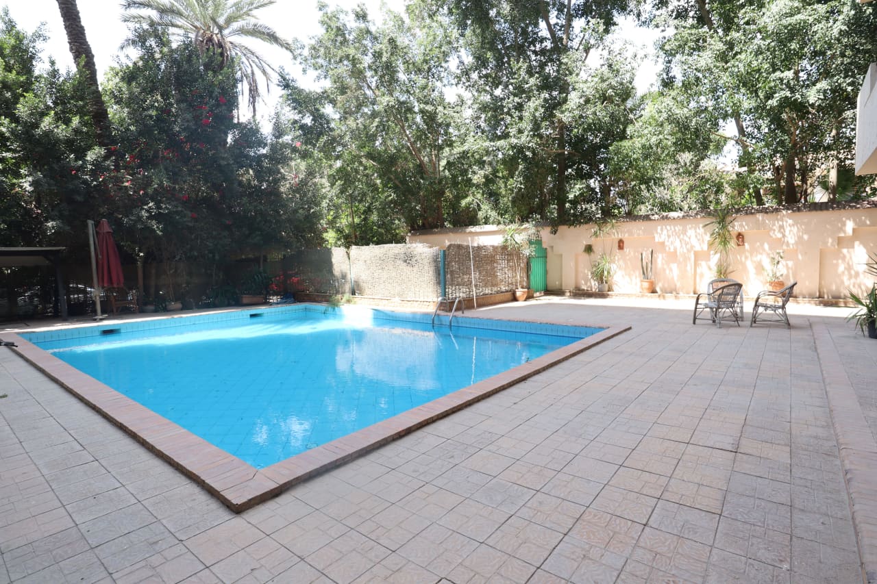 Chic Duplex Retreat with Shared Pool in Sarayat El Maadi.