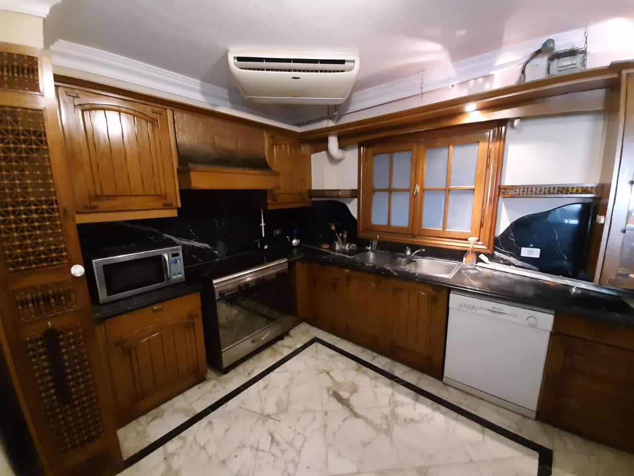 Chic Duplex Retreat with Shared Pool in Sarayat El Maadi.