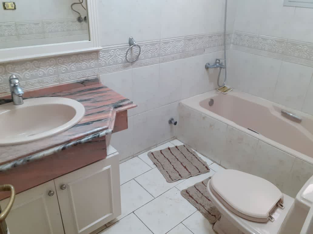 Chic Duplex Retreat with Shared Pool in Sarayat El Maadi.