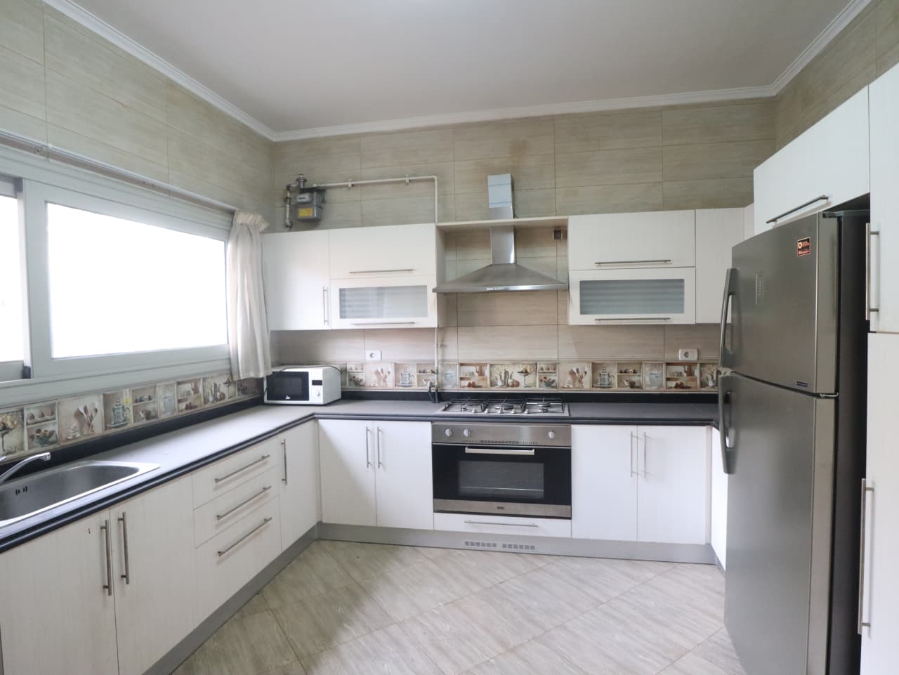 A Spacious Apartment With Shared Pool Access In Maadi Sarayat.
