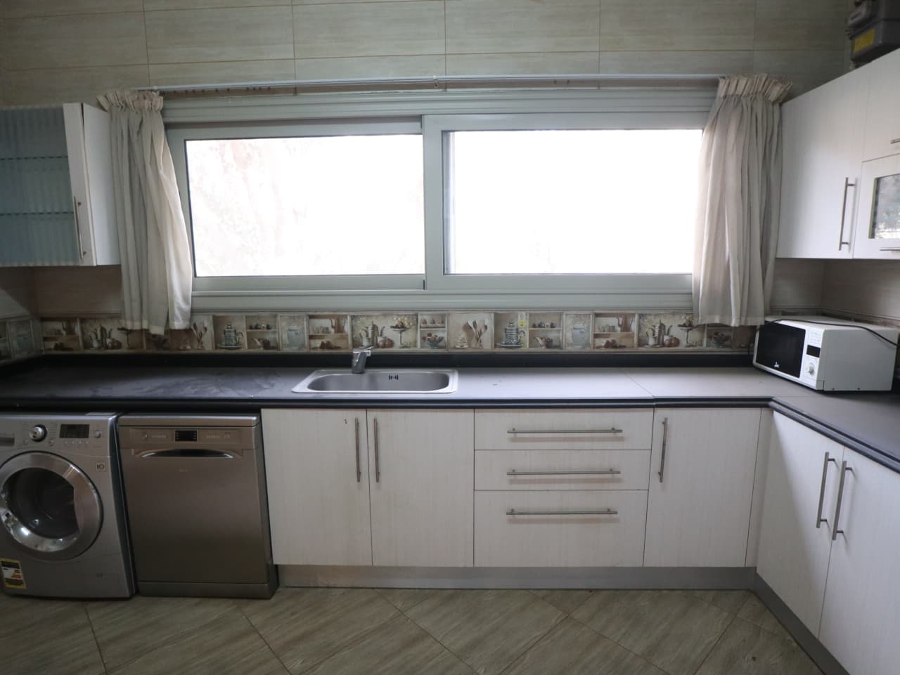 A Spacious Apartment With Shared Pool Access In Maadi Sarayat.