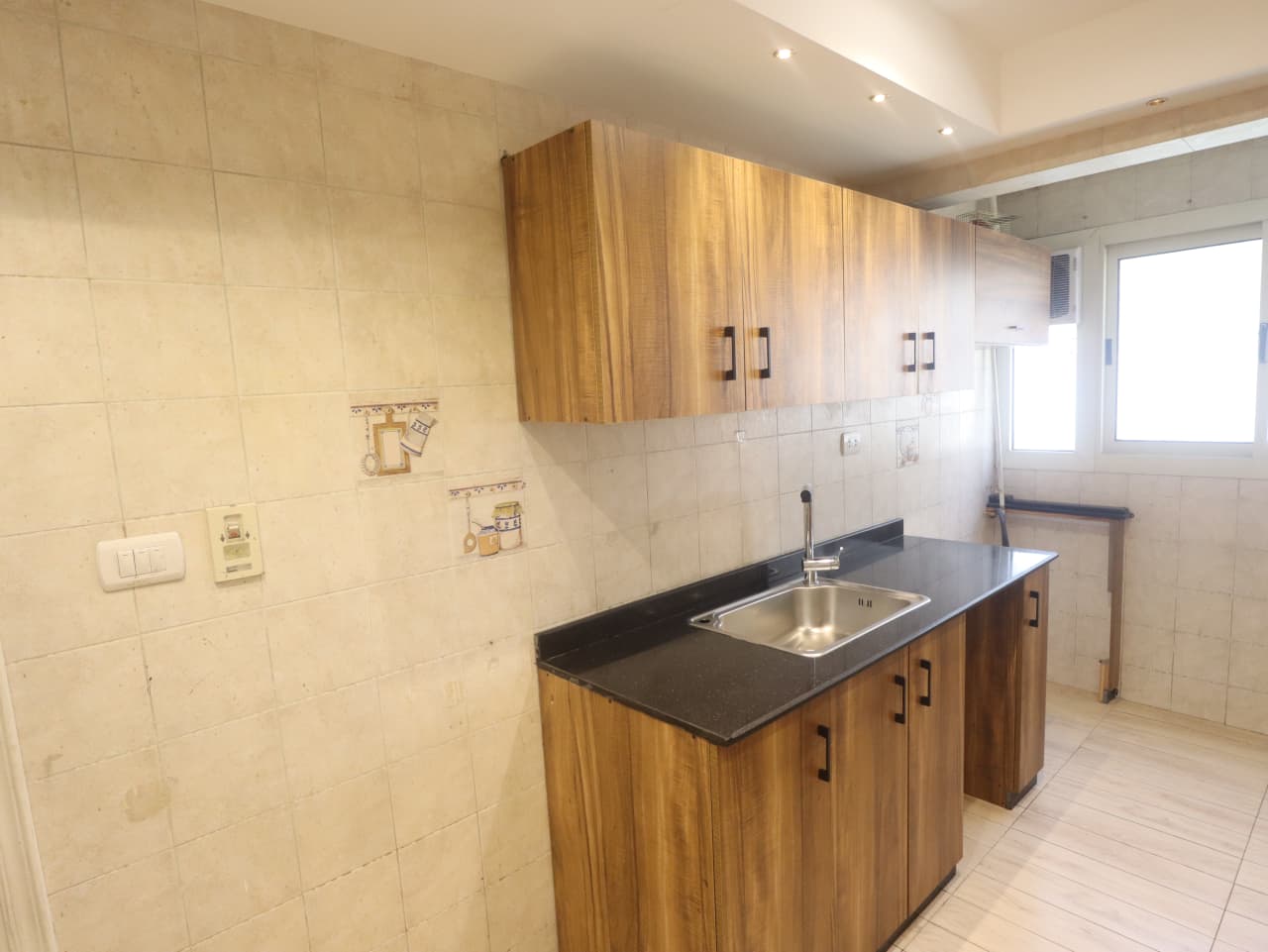 Sunny Semi-Furnished Apartment In The Heart Of Maadi.