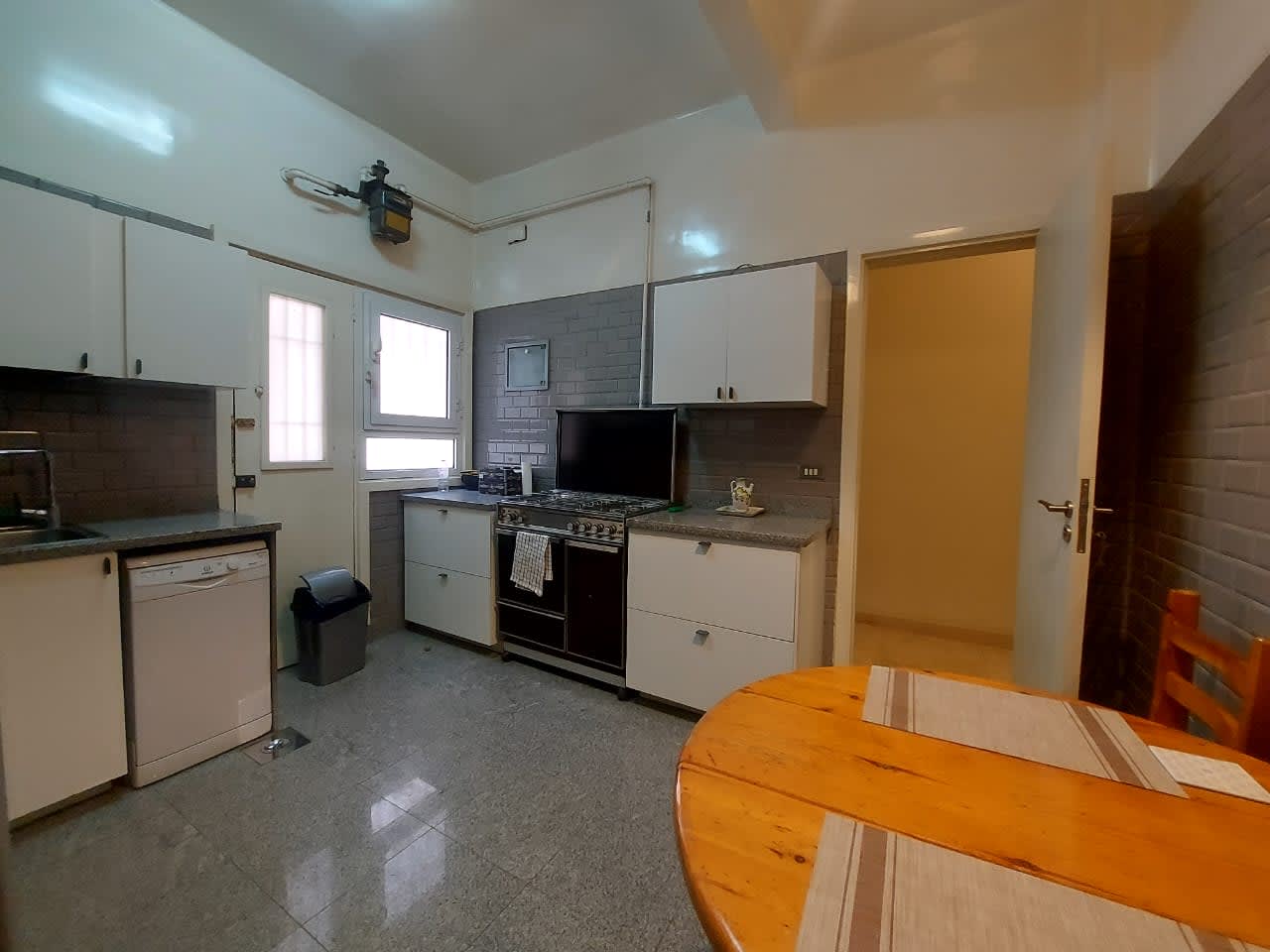 Bright 2BR Apartment with Equipped Kitchen & Balcony