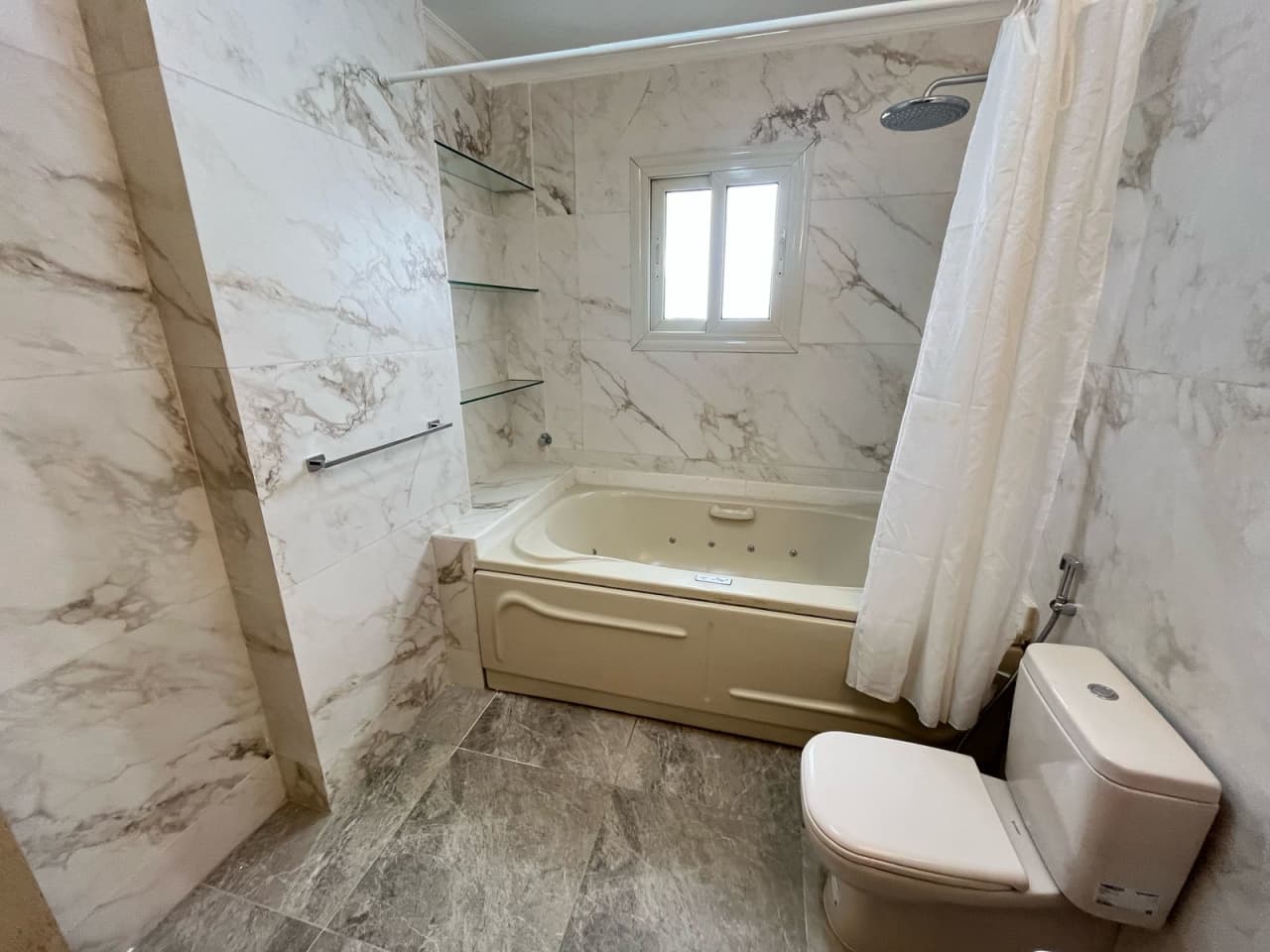 Spacious 4 Bedroom Apartment with Terrace & Pool Access