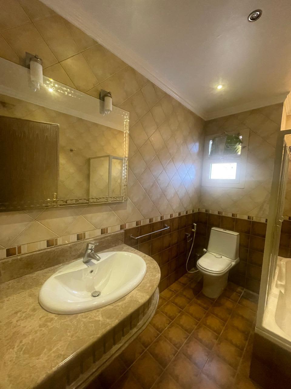 Sunlit 3BR Apartment with Balcony Views in New Maadi