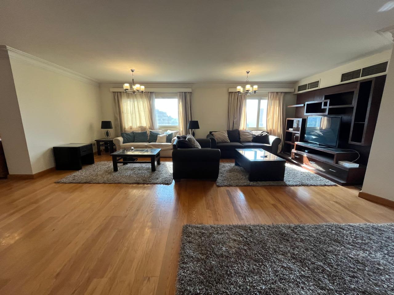 Spacious 4-Bedroom Apartment with Gym and Pool Access