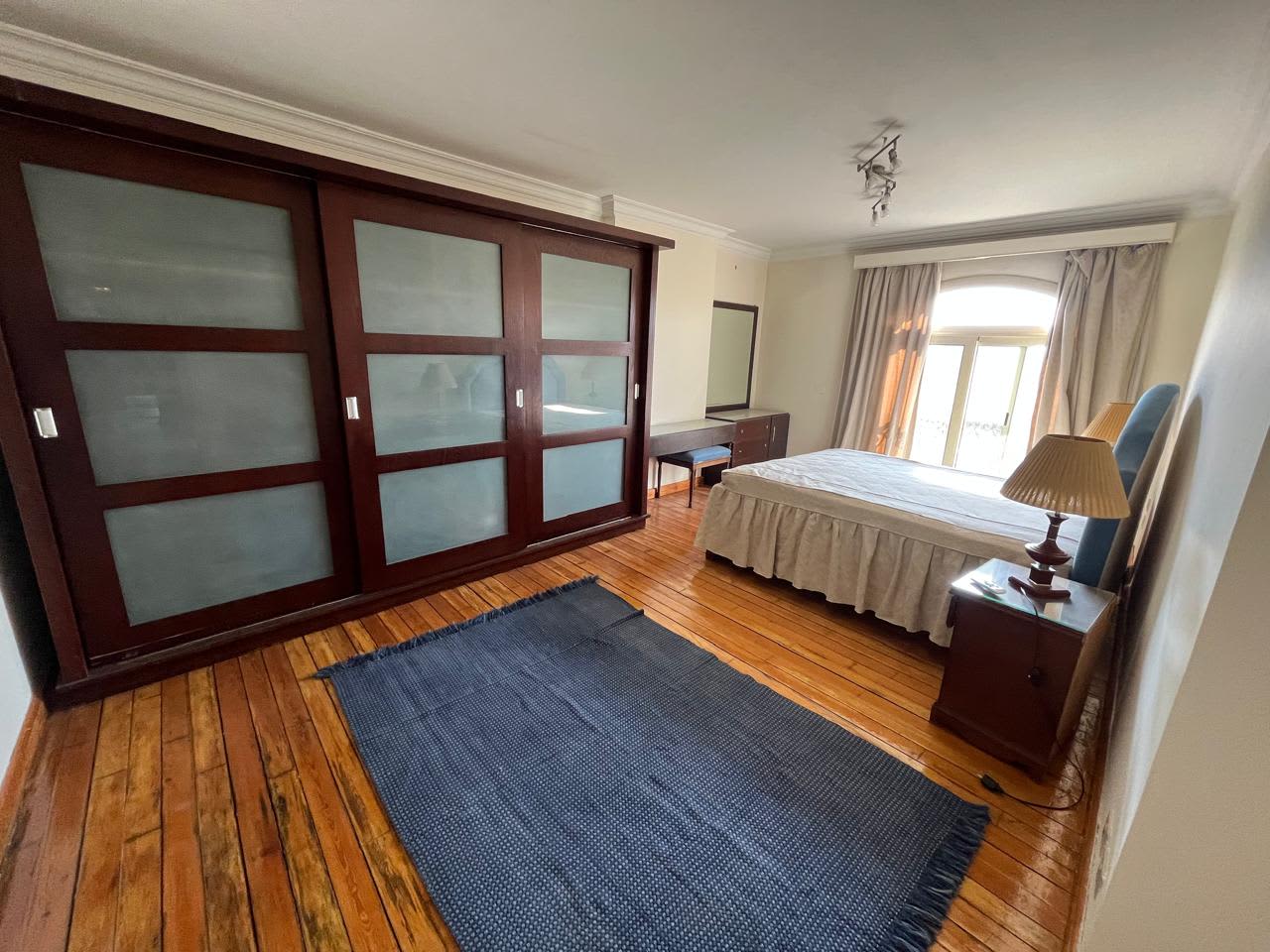 Spacious 4-Bedroom Apartment with Gym and Pool Access