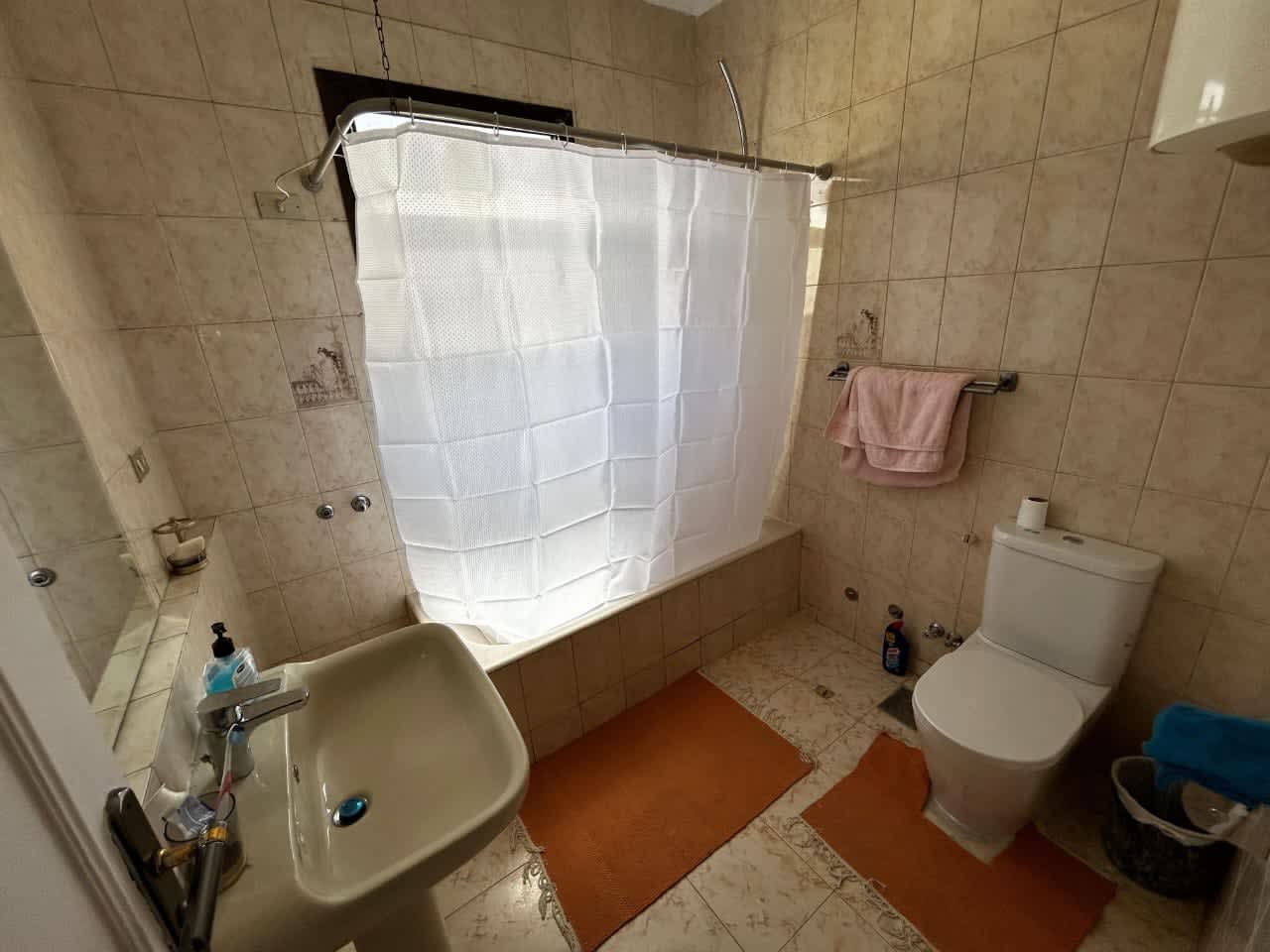 Sunlit 3-Bedroom Apartment with Private Balcony