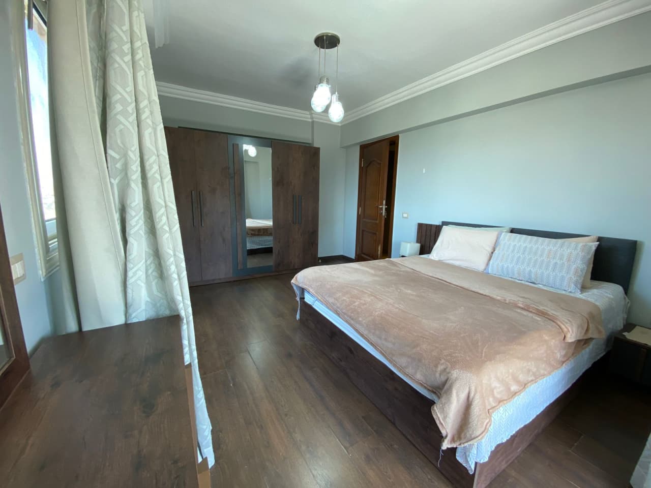Sunny 3-Bedroom Apartment with Private Balcony