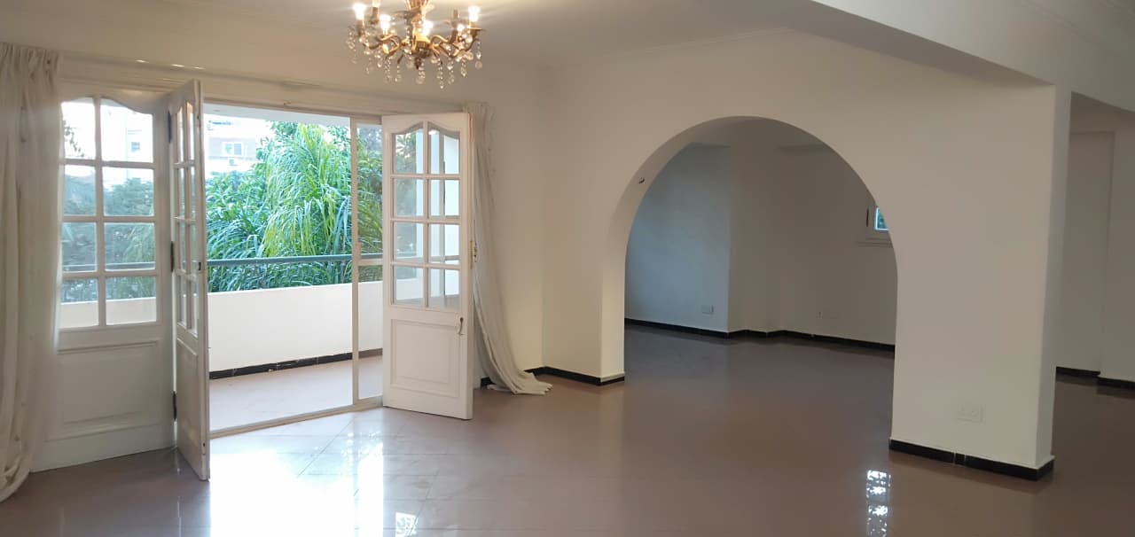 Modern Semi-Furnished Apartment with Kitchen Appliances.