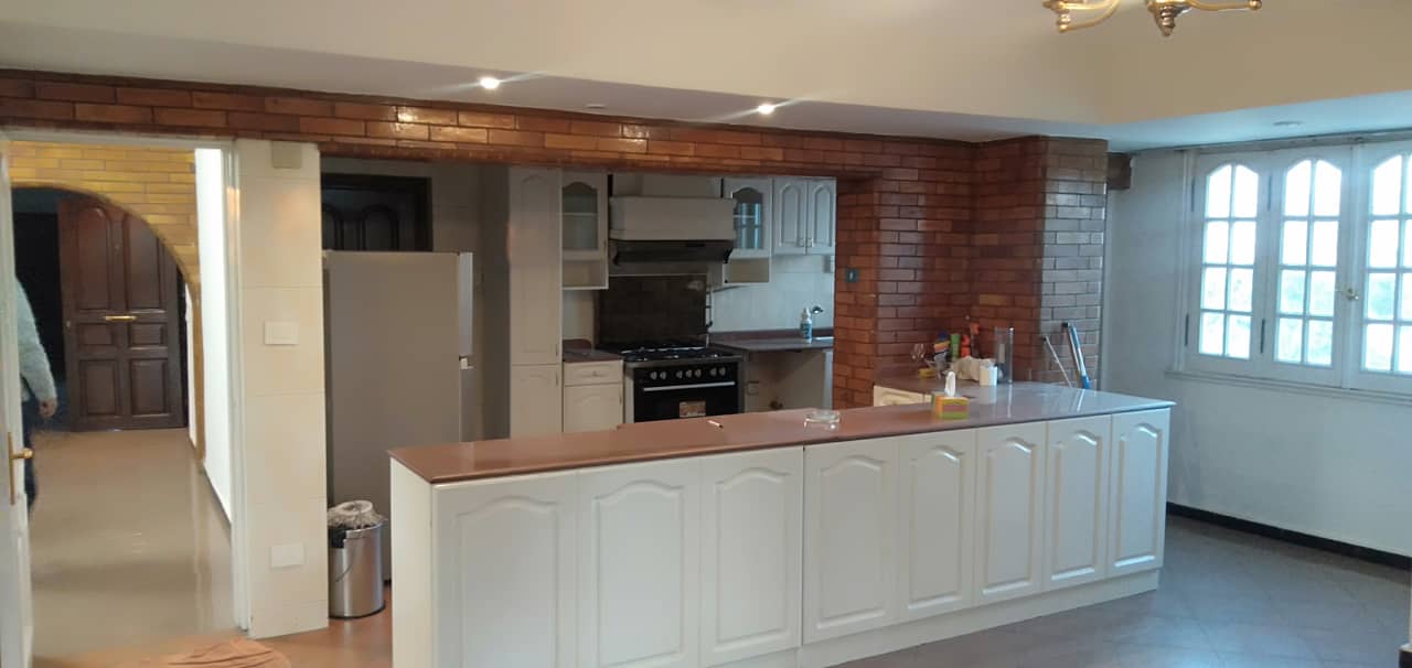 Modern Semi-Furnished Apartment with Kitchen Appliances.