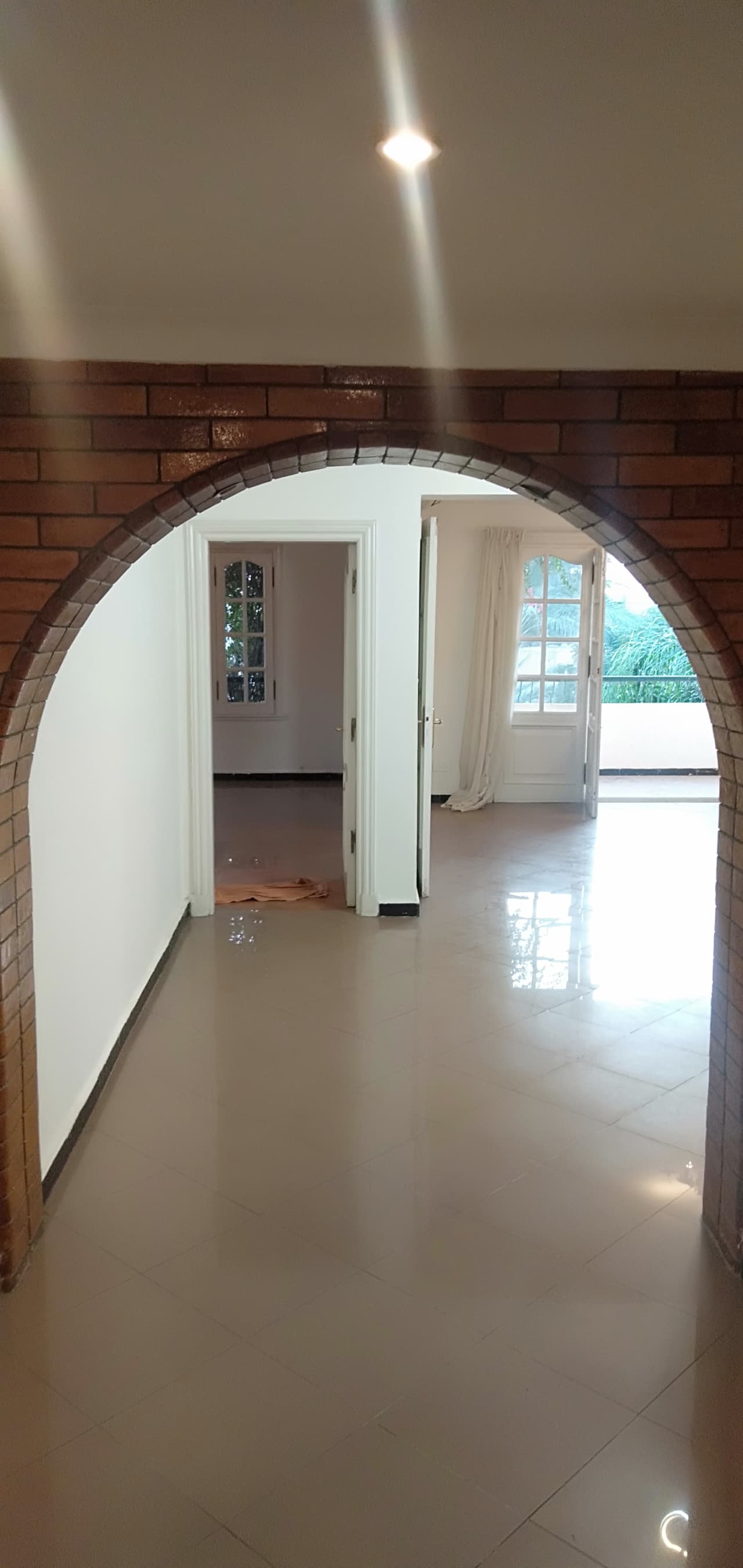 Modern Semi-Furnished Apartment with Kitchen Appliances.